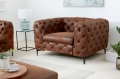 Pikowany fotel na metalowych nogach, w kolorze brązowym 120/70cm cm RUSTIC